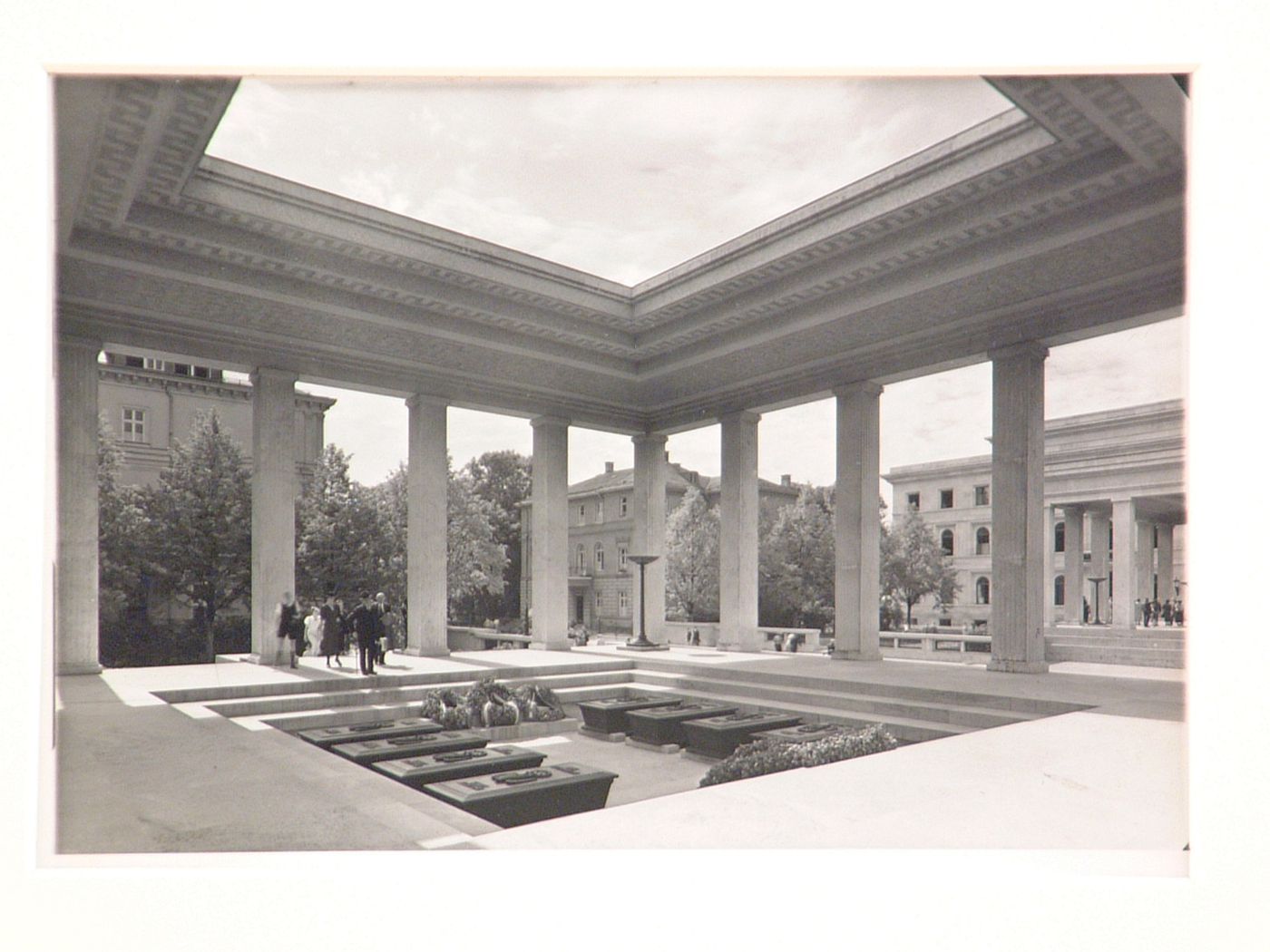 Open air memorial structure with columns, sarcophagi, in sunken court, Munich, Germany