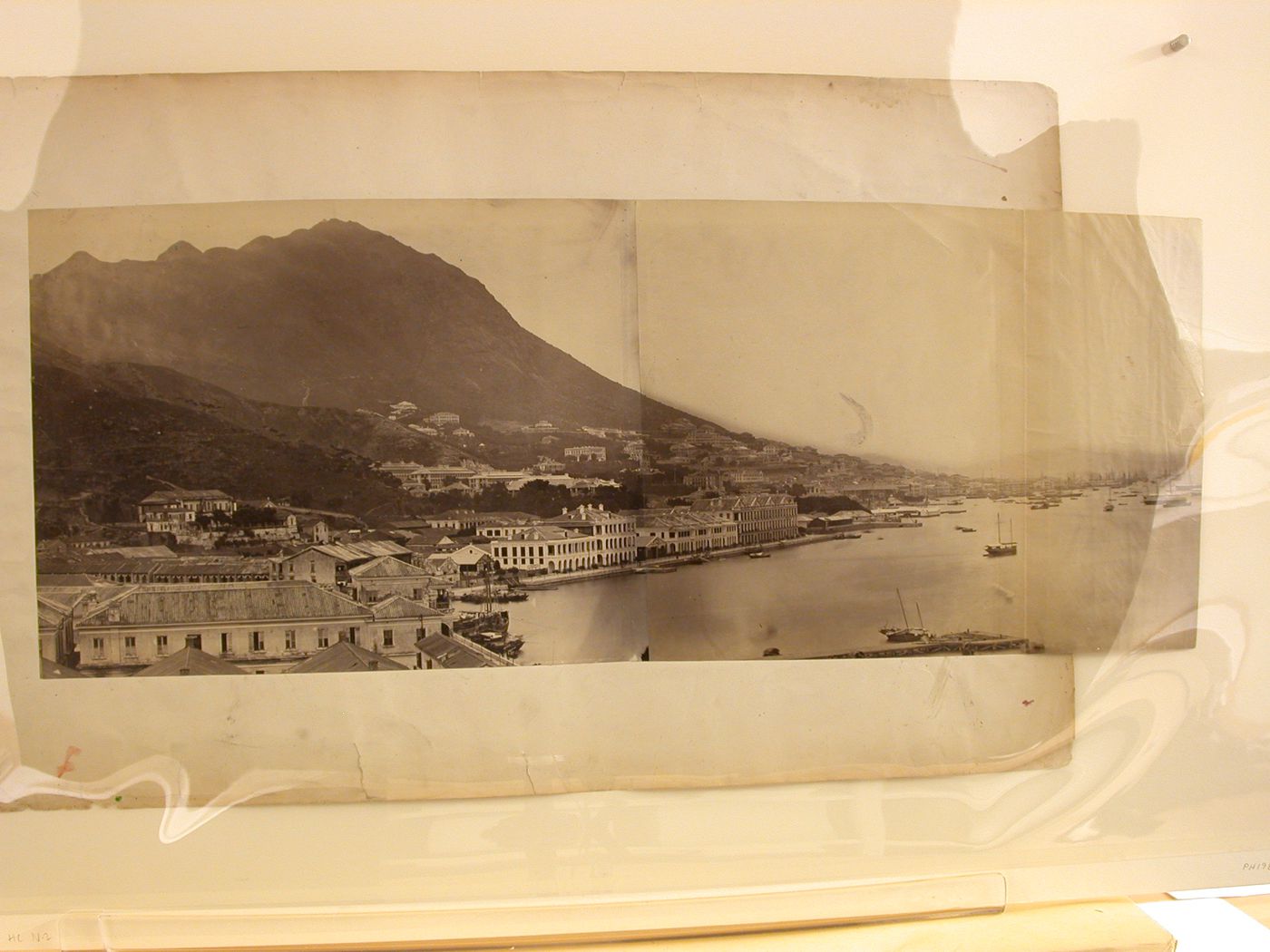 View of Victoria Harbour and Victoria Peak with the godowns of Jardine Matheson in the foreground, Hong Kong (now Hong Kong, China)