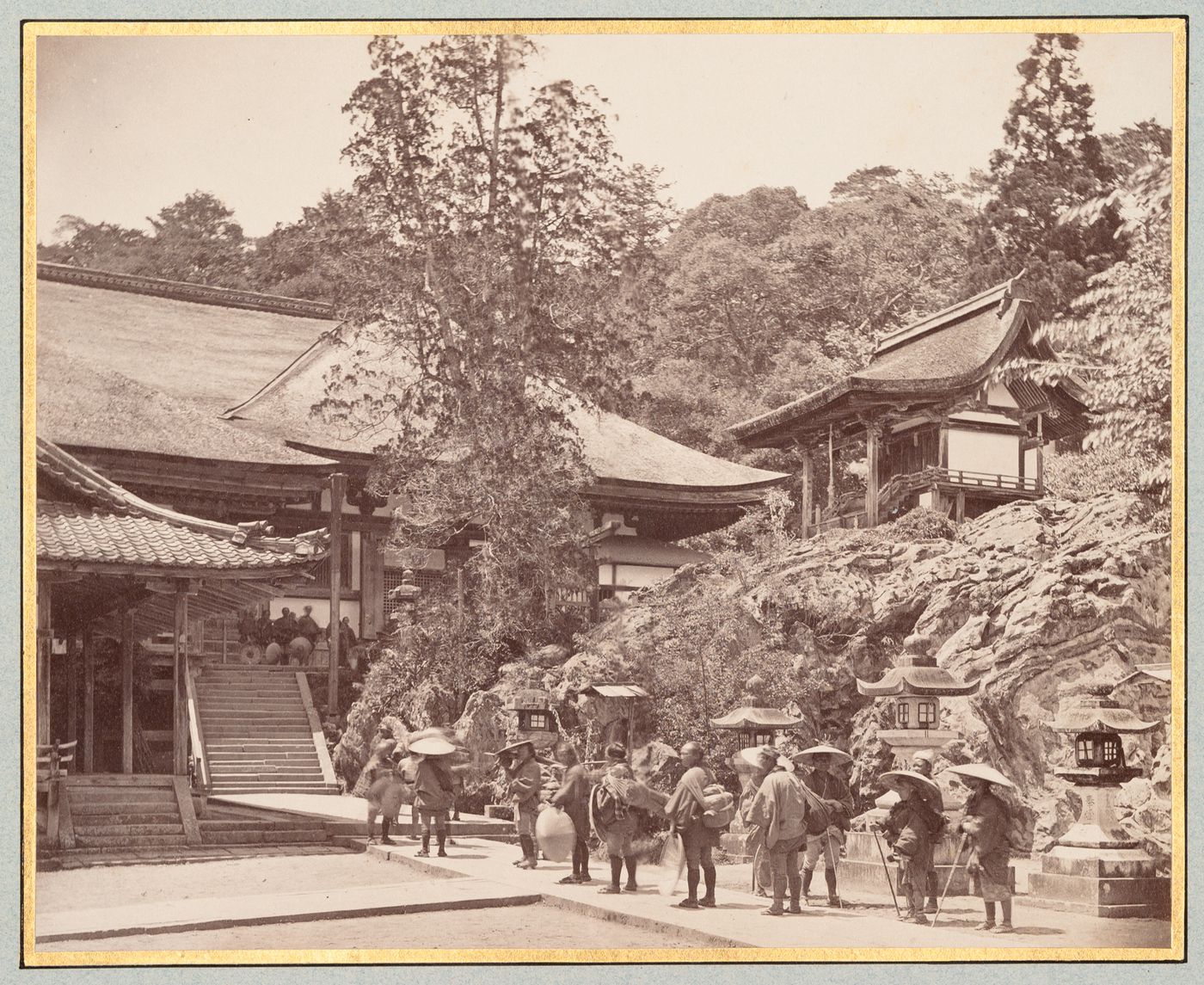 View of the Ishiyamadera Temple complex showing buildings, stairs, stone lanterns and people, Otsu-shi, Shiga-ken, Japan
