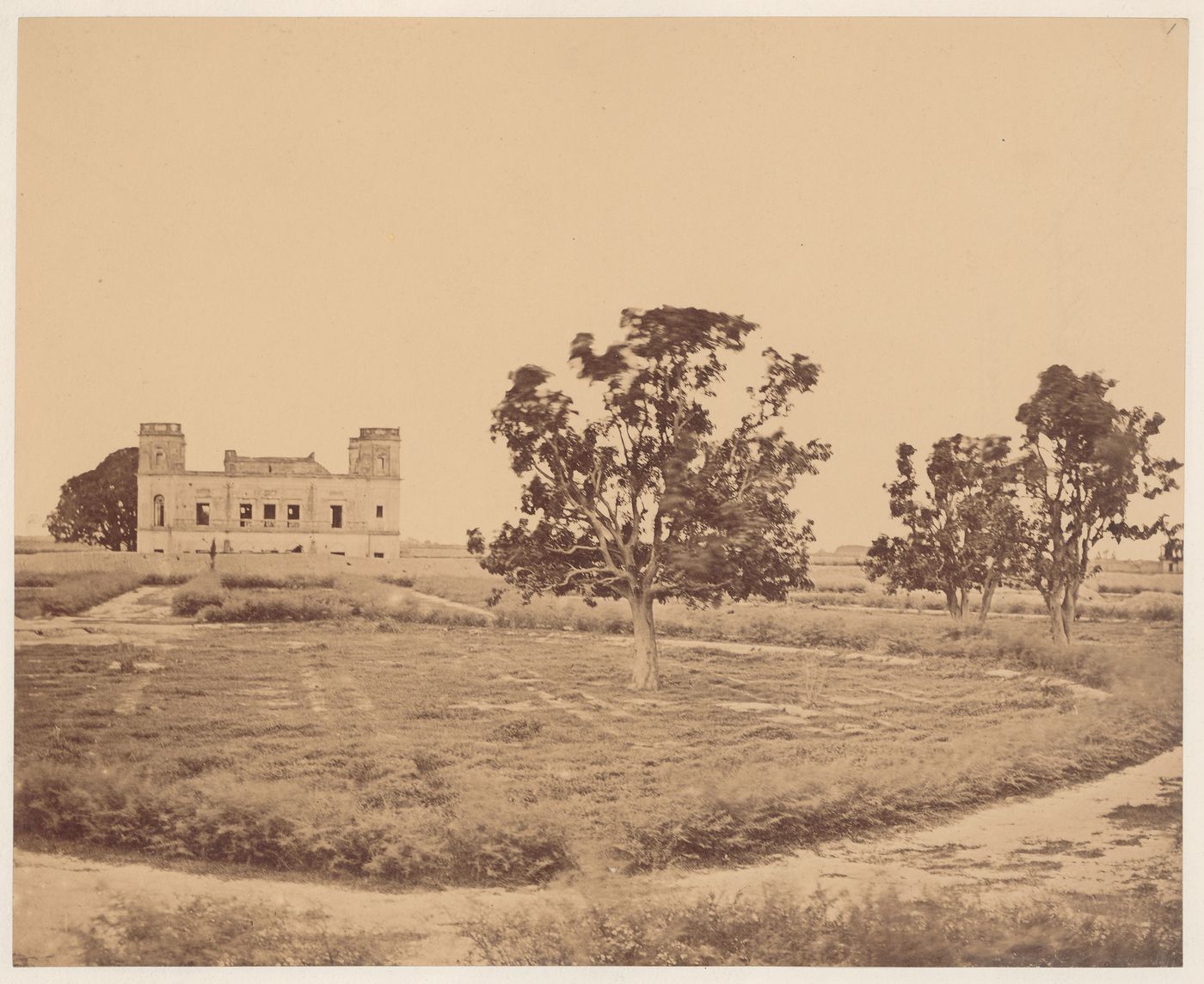 View of the burial site of Major General Sir Henry Havelock showing the ruins of the mansion of the Alam Bagh [World's Garden complex] in the background, near Lucknow, India