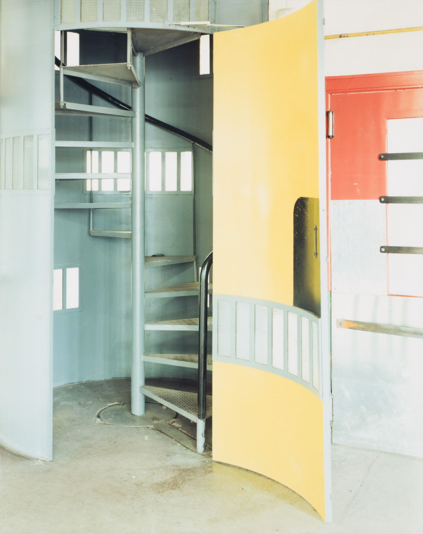 Interior view of the Duval factory showing spiral stairs, Saint-Dié, France