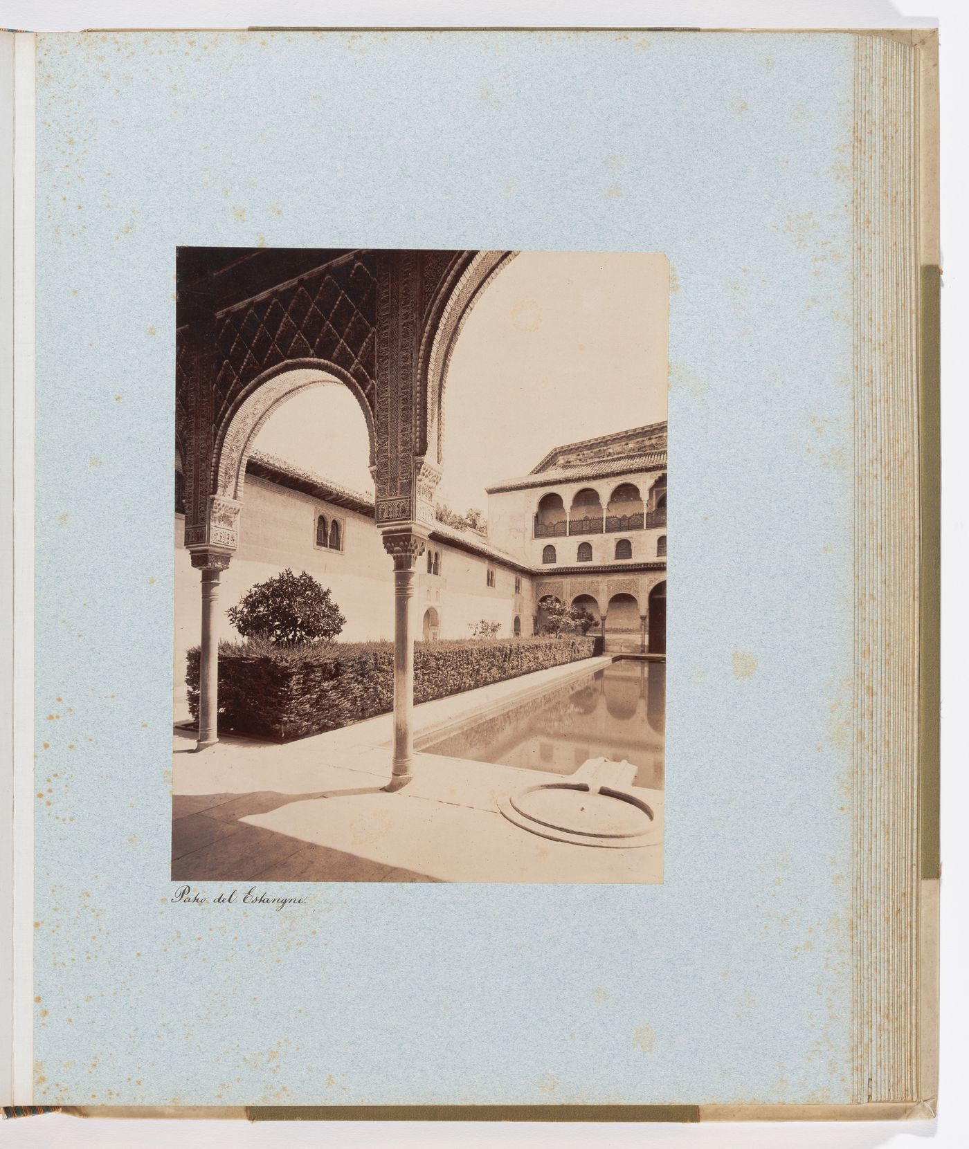 View of arches, pond and south pavilion, from Hall of the Boat in Court of the Myrtles, Alhambra, Granada, Spain
