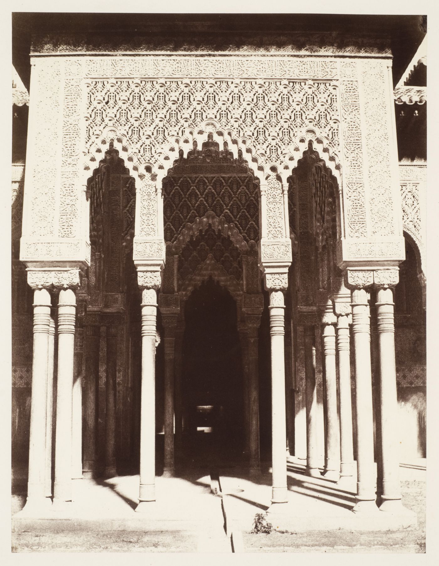 View of the colonnade at the rear of the Court of Lions [Patio de los Leones], Alhambra, Granada, Spain