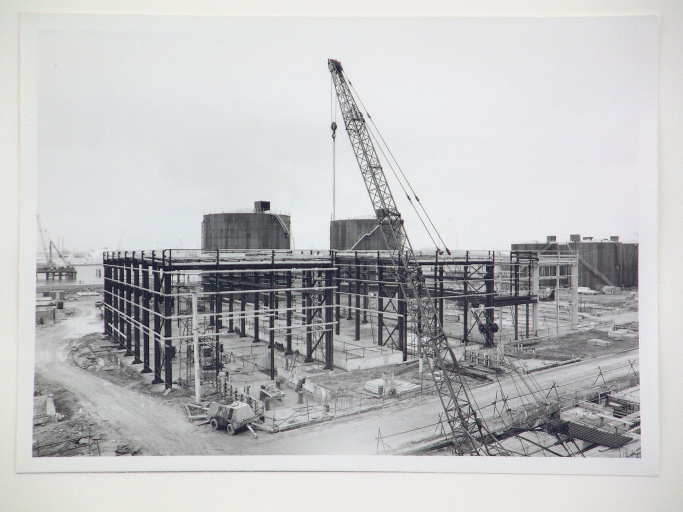 View of cranes and construction of steel structure for power station, United Kingdom