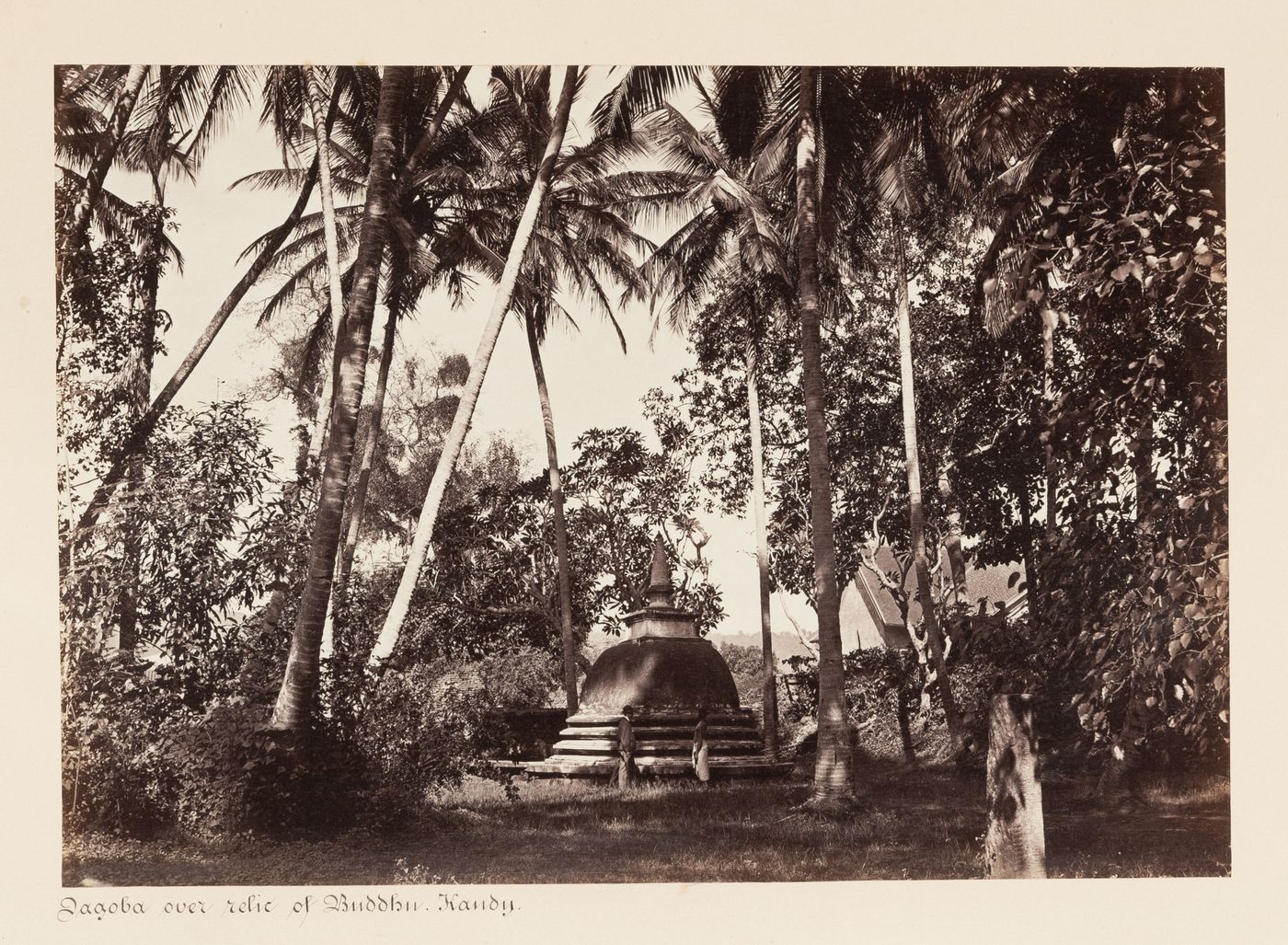 View of a dagoba with St. Paul's Church on the right, Kandy, Ceylon (now Sri Lanka)