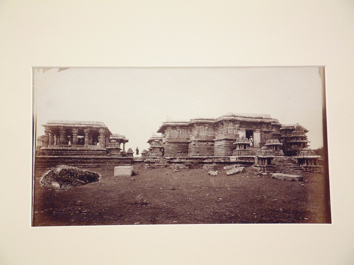 View of the Hoysalesvara Temple with the Nandi shrine on the left and the north entrance on the right, Halebid, India