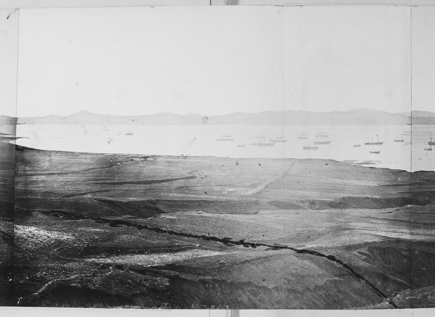 View of Victoria Bay, adjacent to Talien Bay (now Dalian Wan), showing military camps and farmland, near Ch'ing-ni-wa (now  part of Dalian), China