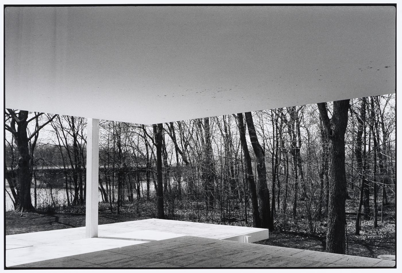 View of supporting structures of Farnsworth House with trees in background, Plano, Illinois, United States