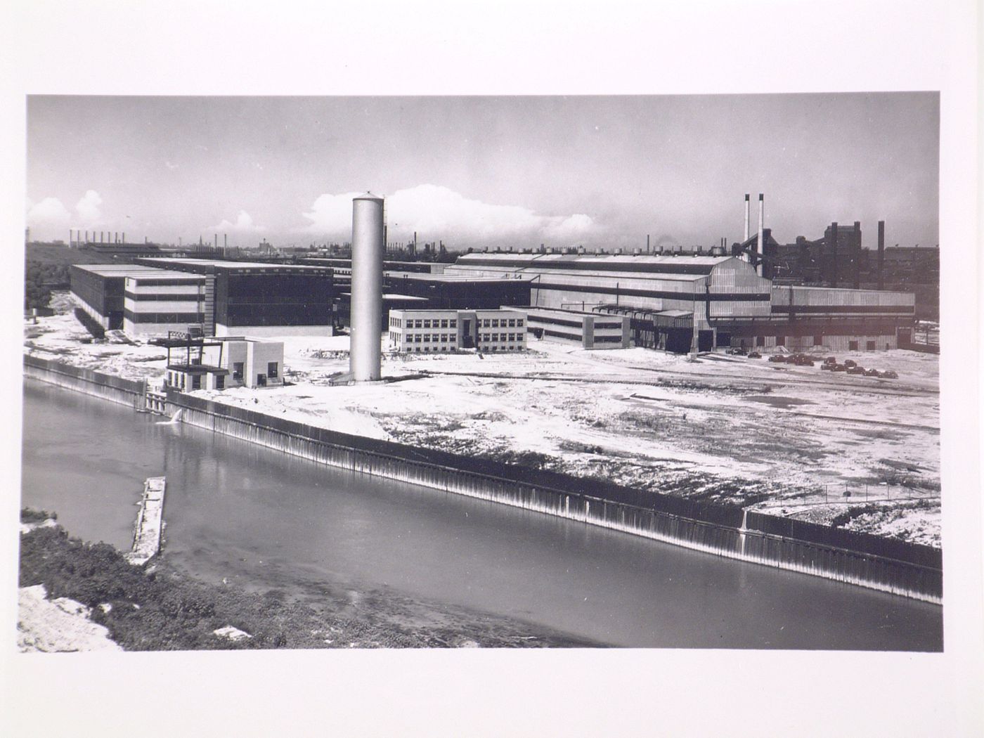 View of the Strip Mill, Administration Building and Welfare Building from across a canal, Republic Steel Corporation Assembly Plant [?], Cleveland, Ohio