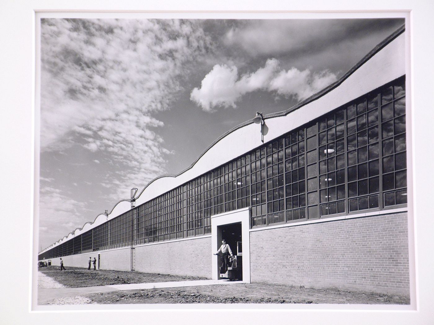 View of the principal façade of the Machine Shop Department of the Automobile Assembly Building (also known as Building No. 4), Dodge Chicago Plant, Chrysler Corporation Dodge division, Chicago, Illinois