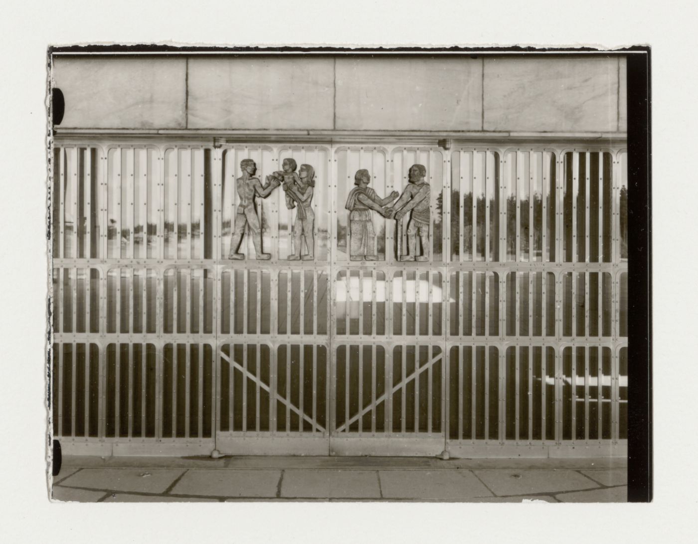 View of the principal façade of the Chapel of the Holy Cross showing the gate with the bronze relief designed by Bror Hjorth, Woodland Crematorium and Cemetery, Stockholm