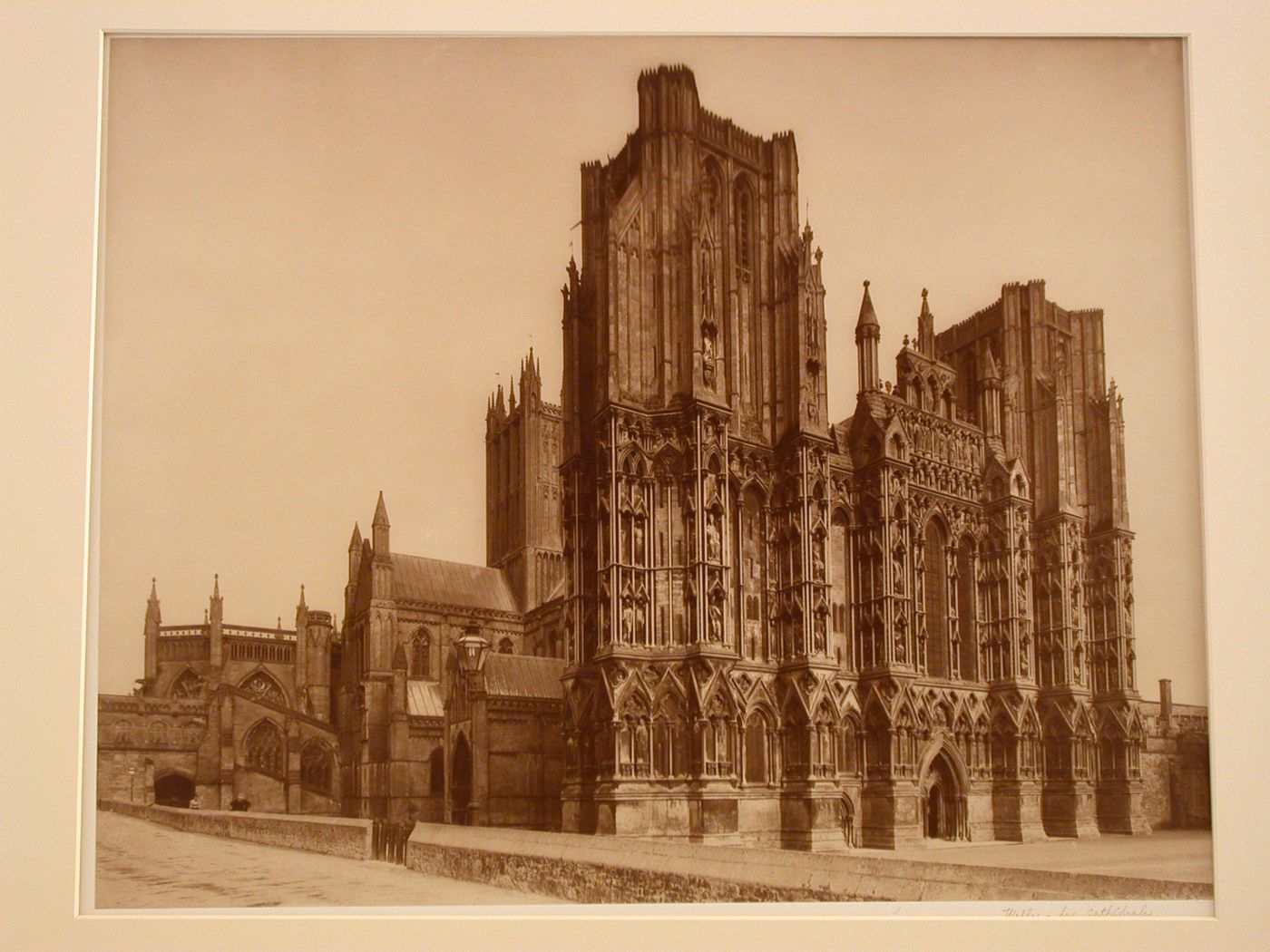 View of west front Wells Cathedral from road beside Close, to the north, Wells, England