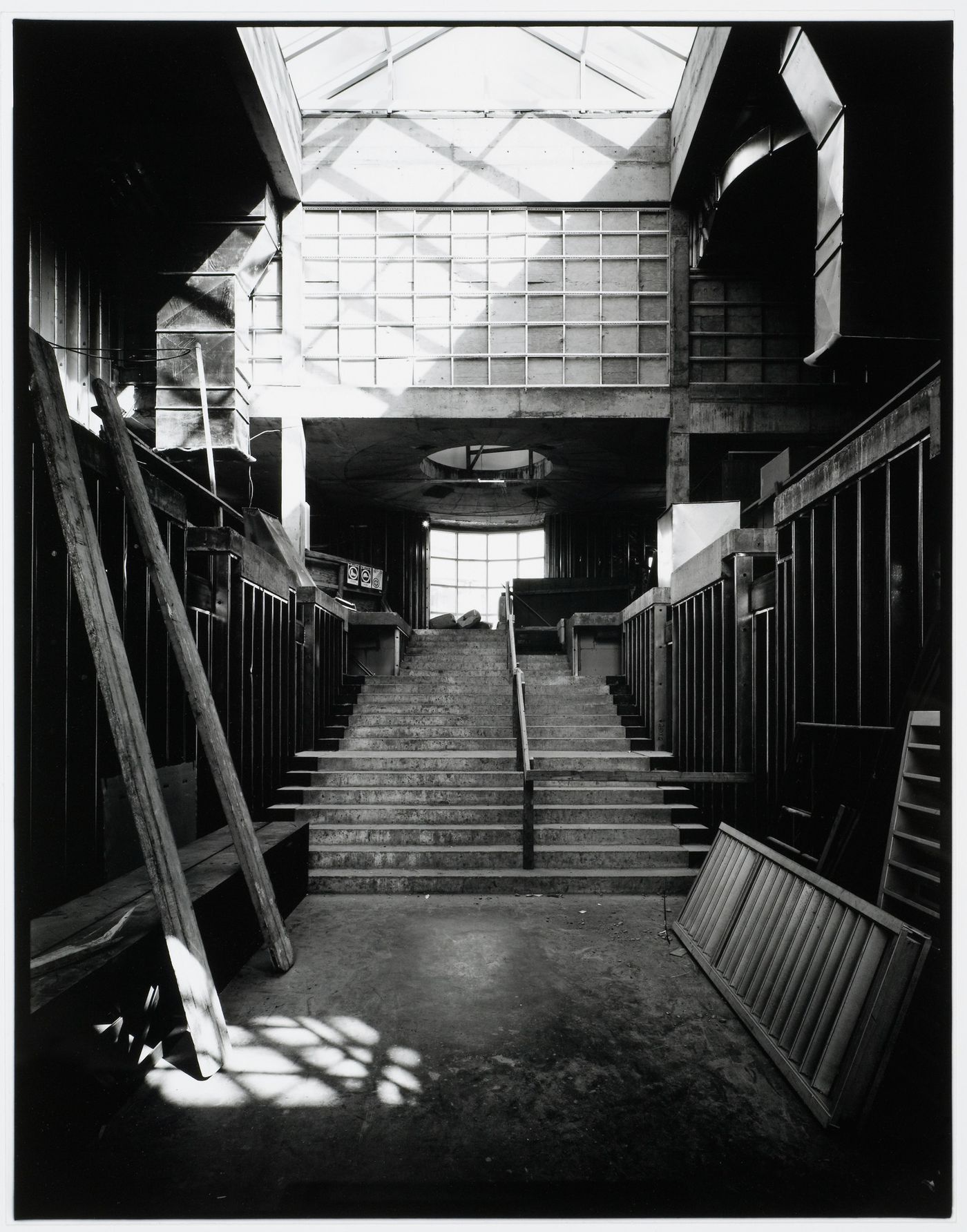 Interior view of the Entrance Court showing stairs, skylight, and building materials, Canadian Centre for Architecture under construction, Montréal, Québec, Canada