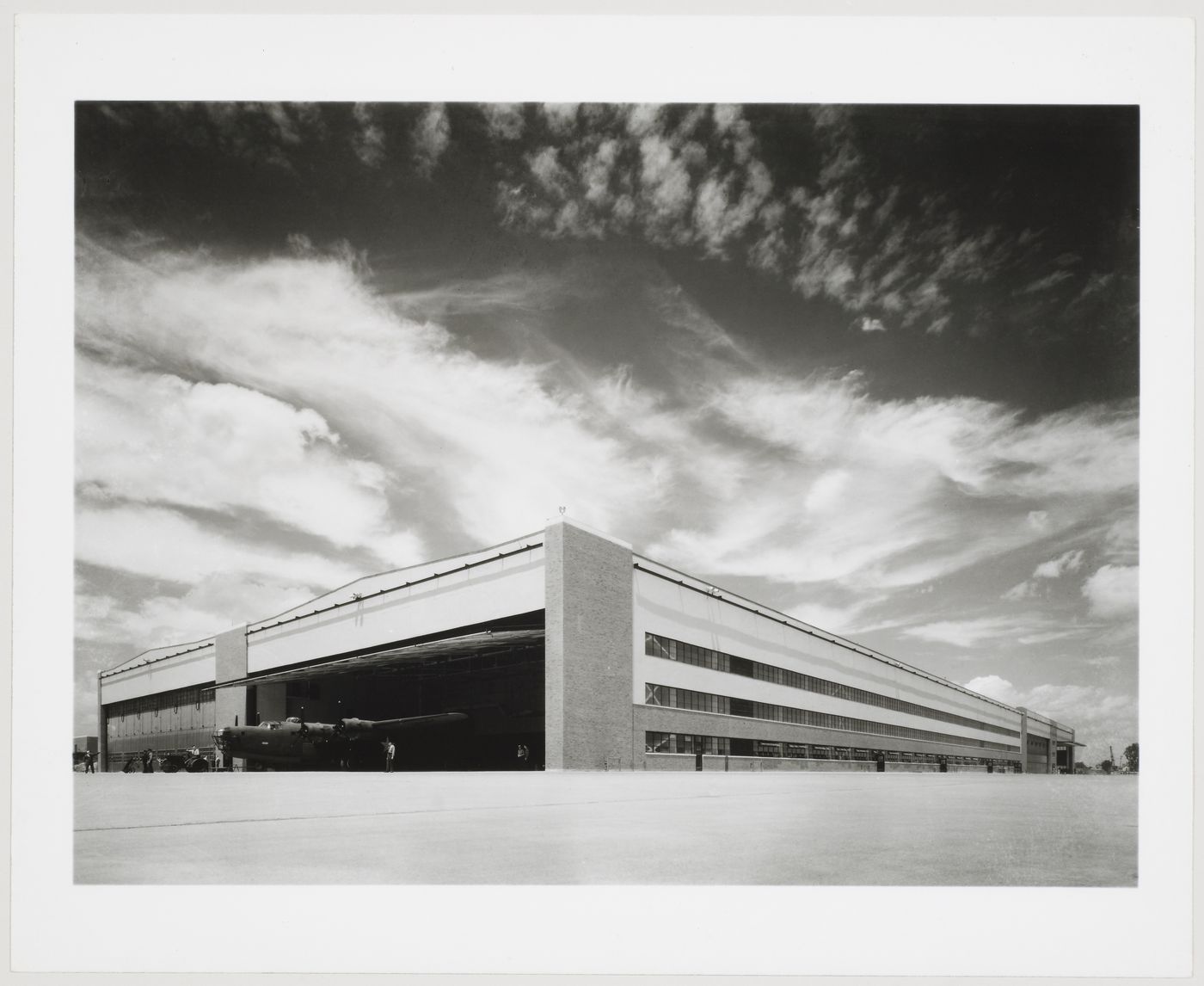 View of the principal and lateral façades of a Hangar, Ford Motor Company Willow Run Bomber Assembly Plant, Willow Run, Michigan