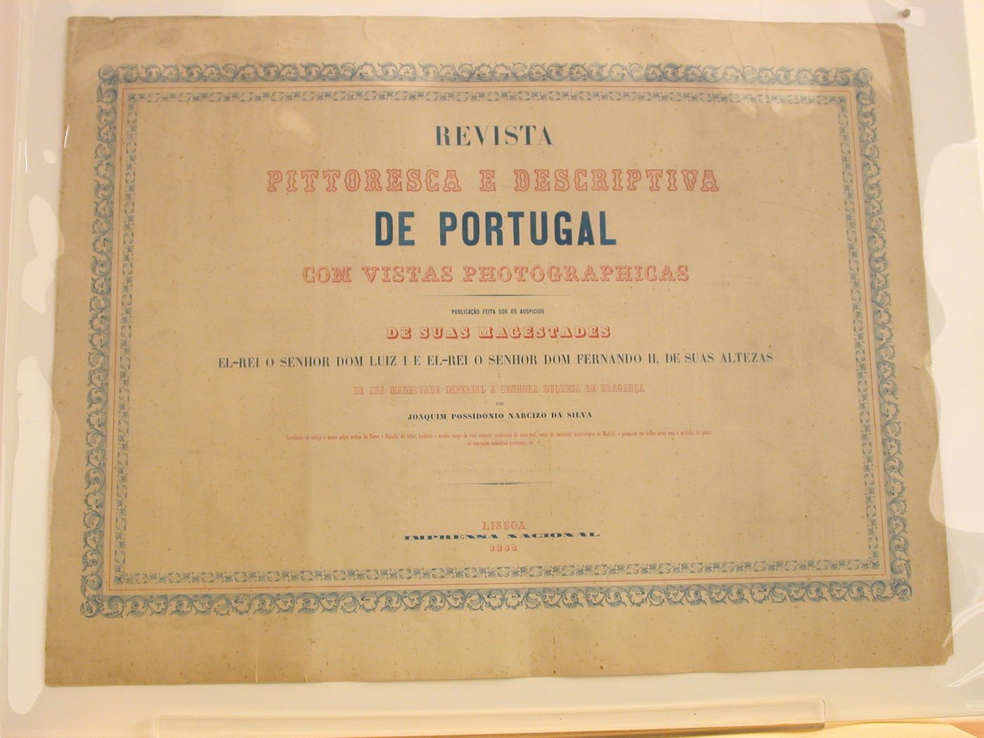 Architectural views of buildings and over views in various cities, with printed columns of text on pages, Portugal