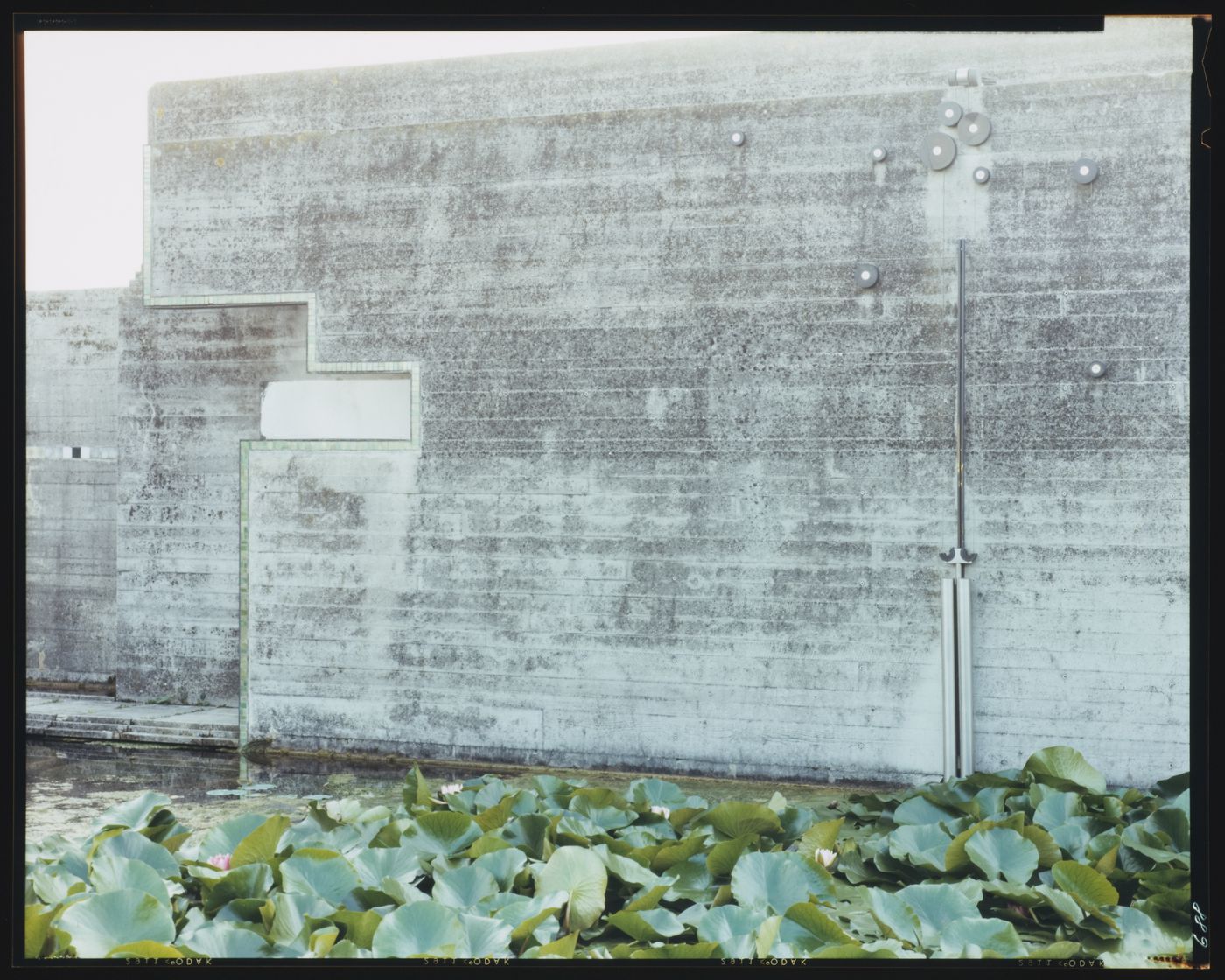 View of the pool, propylaeum and pulley mechanism of a door, Cimitero Brion, San Vito d'Altivole, near Asolo, Italy