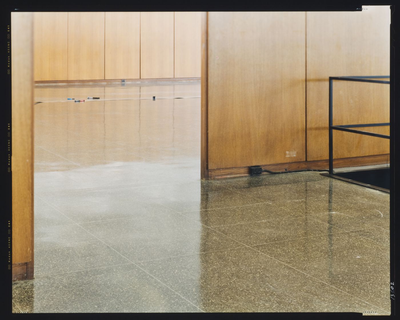 Interior view of Crown Hall showing the floor and wooden walls, Illinois Institute of Technology, Chicago, Illinois