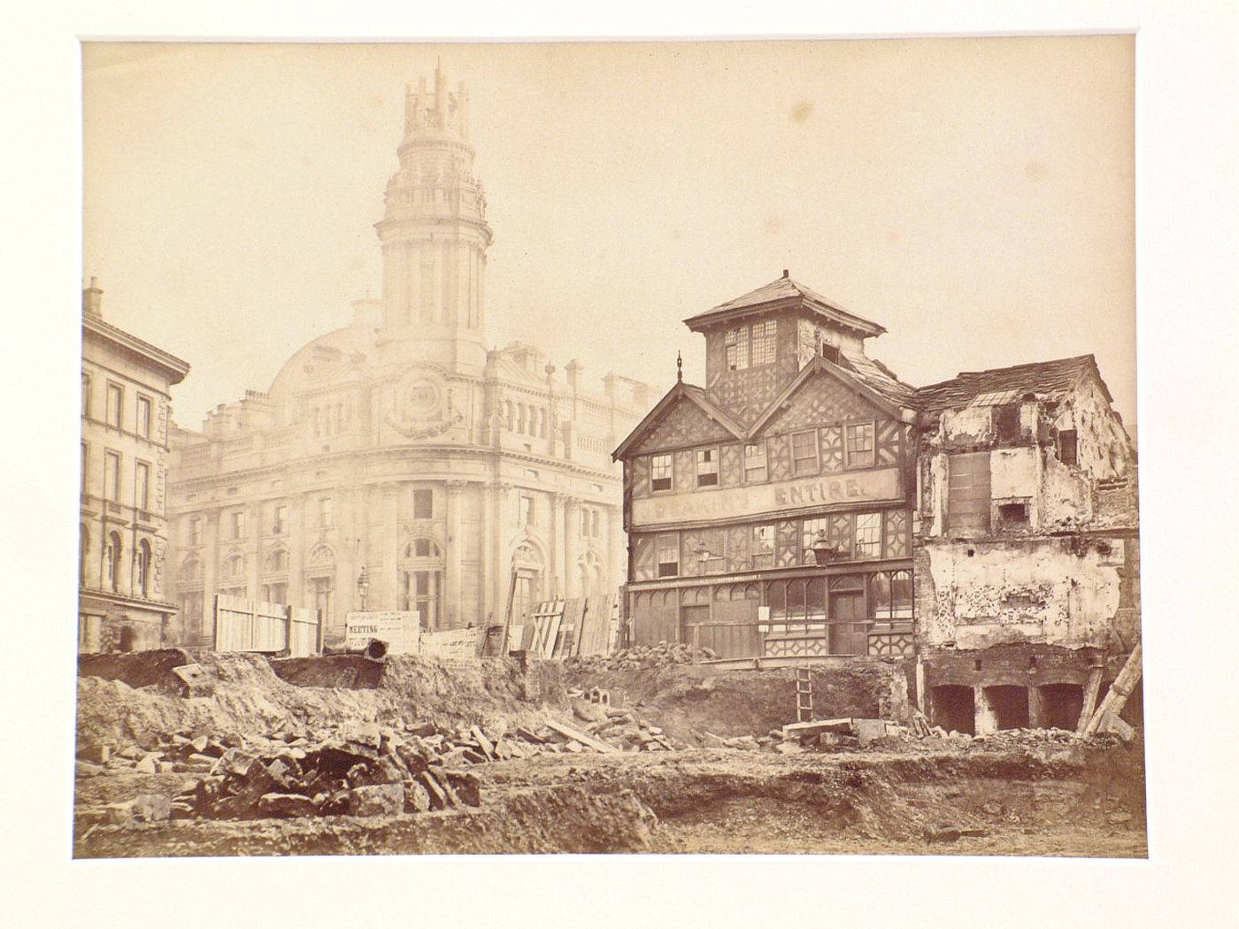 View of demolition/construction site showing Vintner's Arms and the new Royal Exchange, Manchester, England