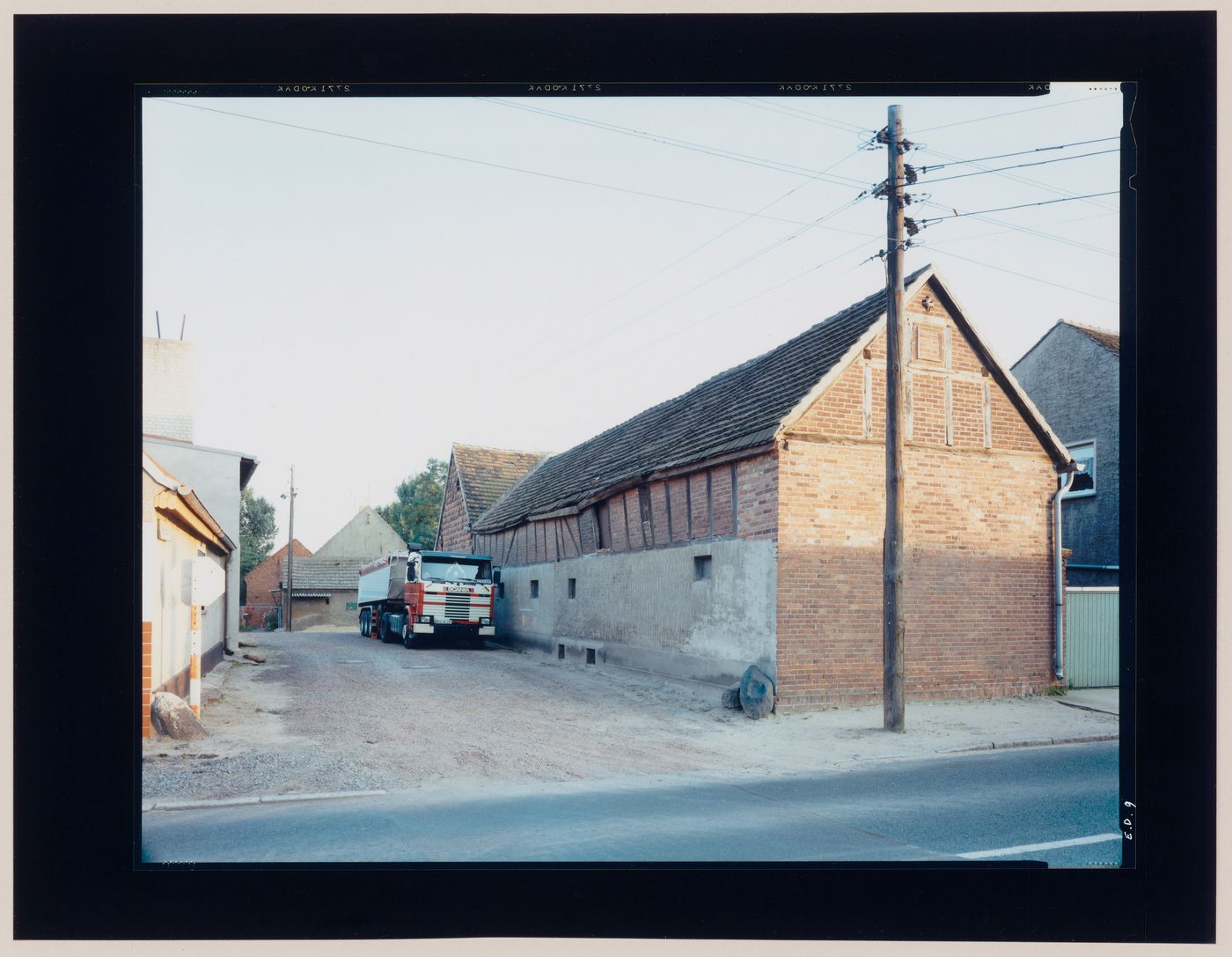 View of a brick warehouse and other buildings, Erxleben, near Magdeburg, Germany (from the series "In between cities")