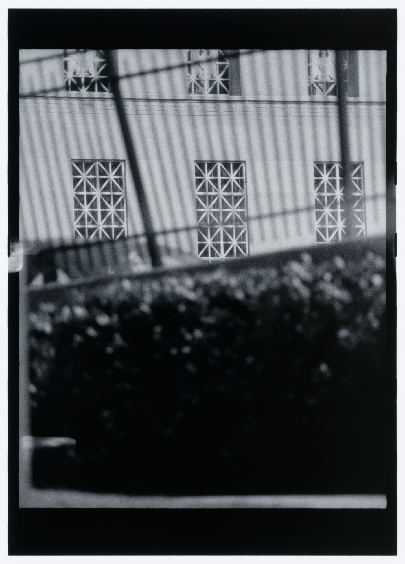 View of the Treasury Building showing windows, cast shadows and vegetation, Washington, D.C., United States, from the series "Empire"