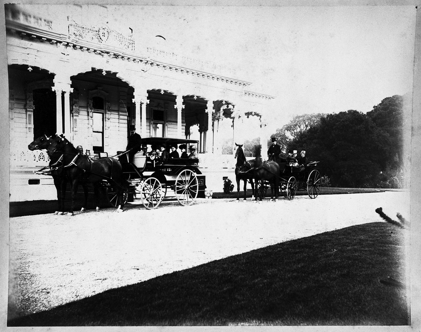 Two horse-drawn carriages carrying James Flood and others, in front of main house, Linden Towers, James Clair Flood Estate, Atherton, California