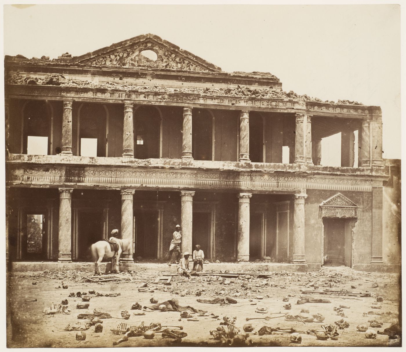 View of the ruins of Sikandarbagh Palace showing the skeletal remains of rebels in the foreground, Lucknow, India