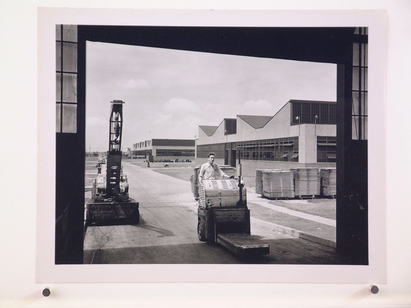 View of the principal and lateral façades of the Machine Shops (also known as Buildings Nos. 2, 3 and 4), United States Naval Ordnance Assembly Plant, Center Line, Michigan