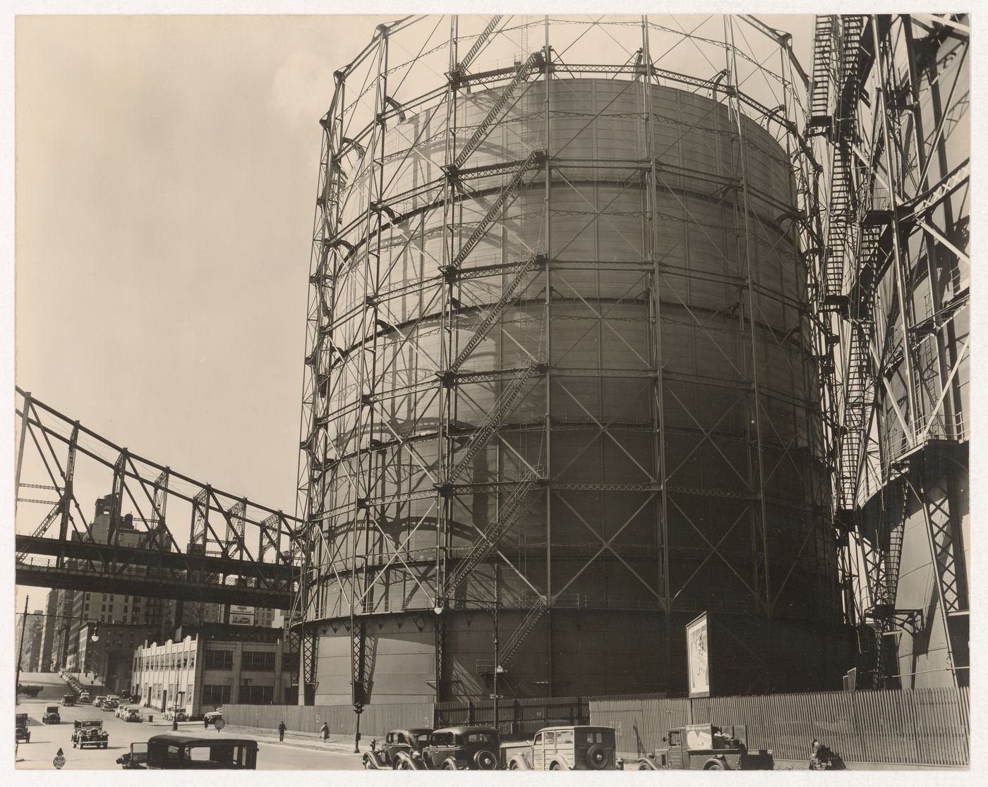 Gas tank and Queensborough Bridge; or 'El' 2nd and 3rd Avenue Line