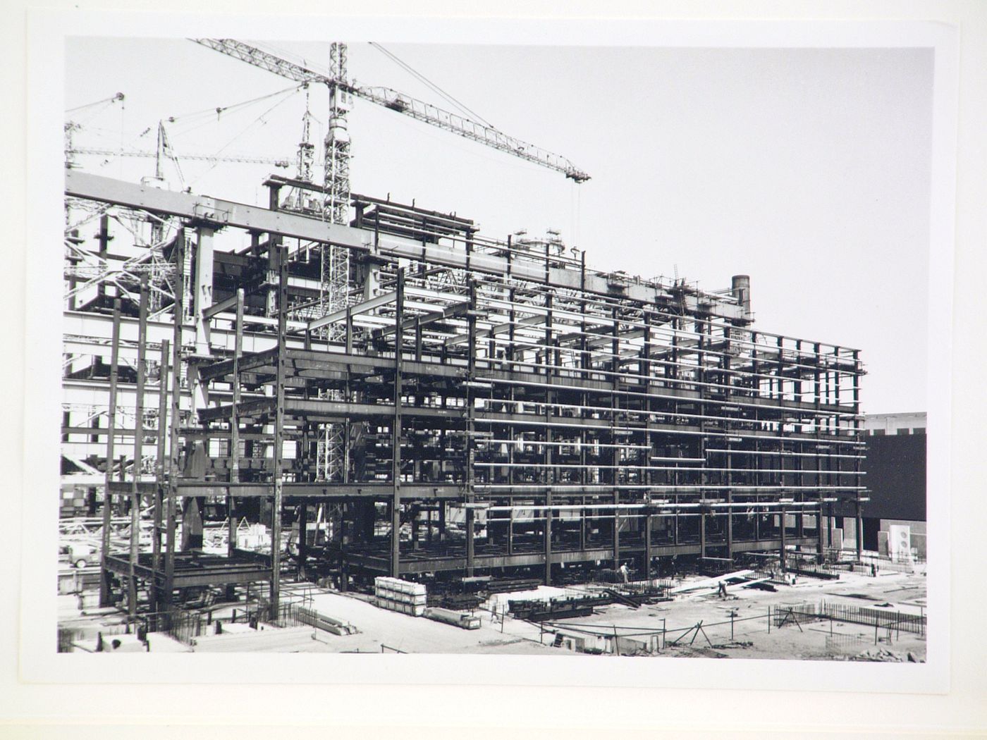 View of crane and construction of steel structure for power station, United Kingdom