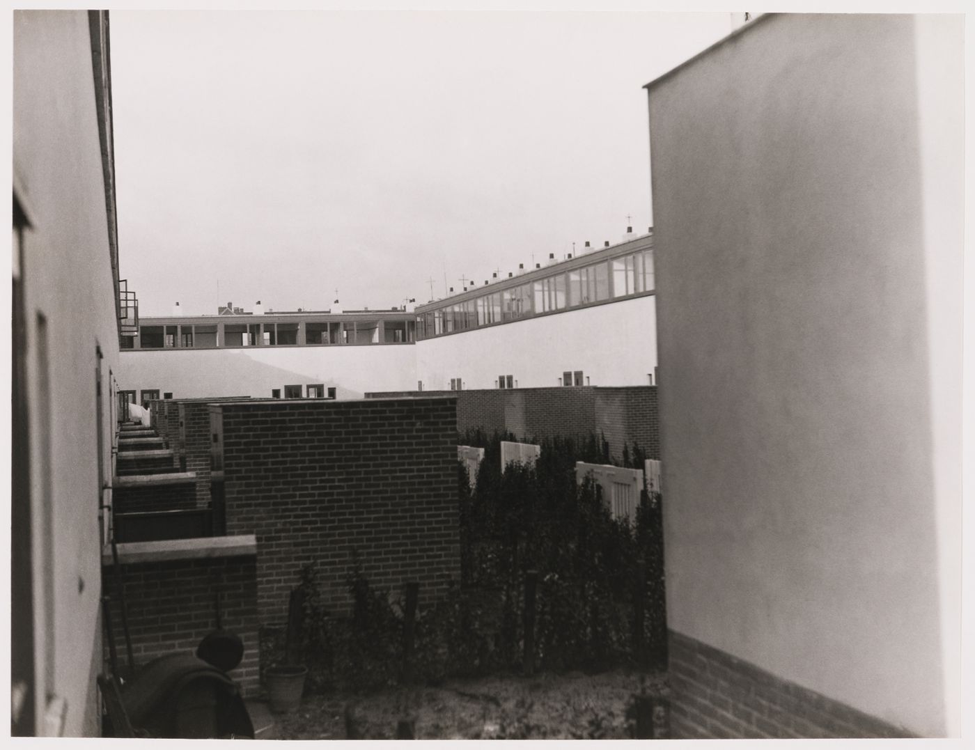 Exterior view of Kiefhoek Housing Estate showing walled gardens, Rotterdam, Netherlands