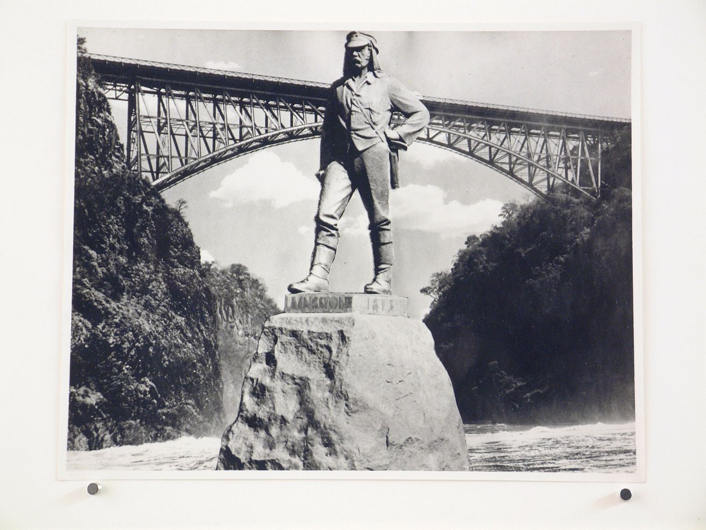 View of David Livingstone memorial statue and Victoria Falls Bridge, Zambezi River, crossing the border between Victoria Falls, Zimbabwe and Livingstone, Zambi