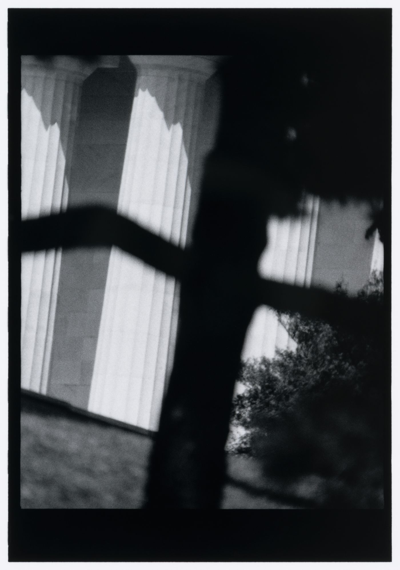 Partial view of the Lincoln Memorial showing trees and shadows in the foreground, Washington D.C., United States, from the series "Empire"