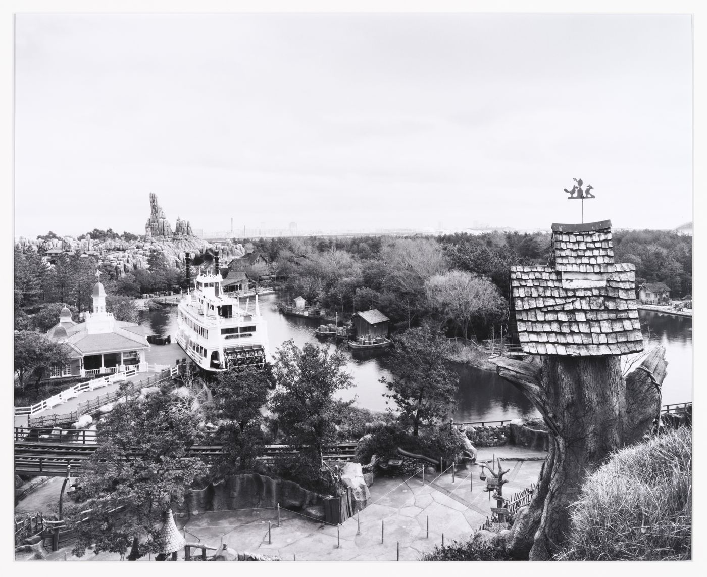 View of Westernland with Mark Twain-style boat, Disneyland, Tokyo, Japan