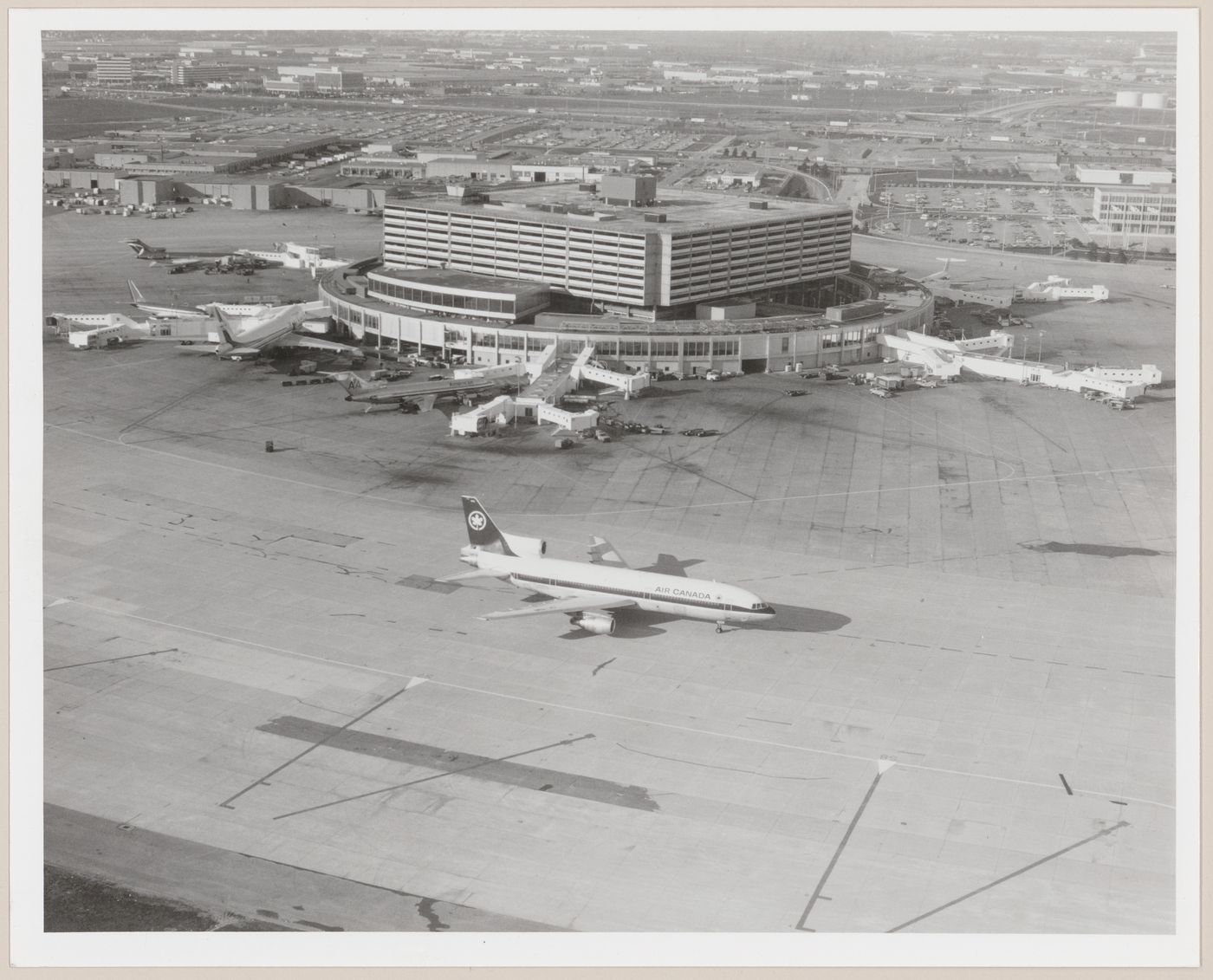 Toronto Pearson International Airport - original terminal No. 1 with an Air Canada Lockheed 1011 (Tristar) taxiing by, Mississauga, Ontario