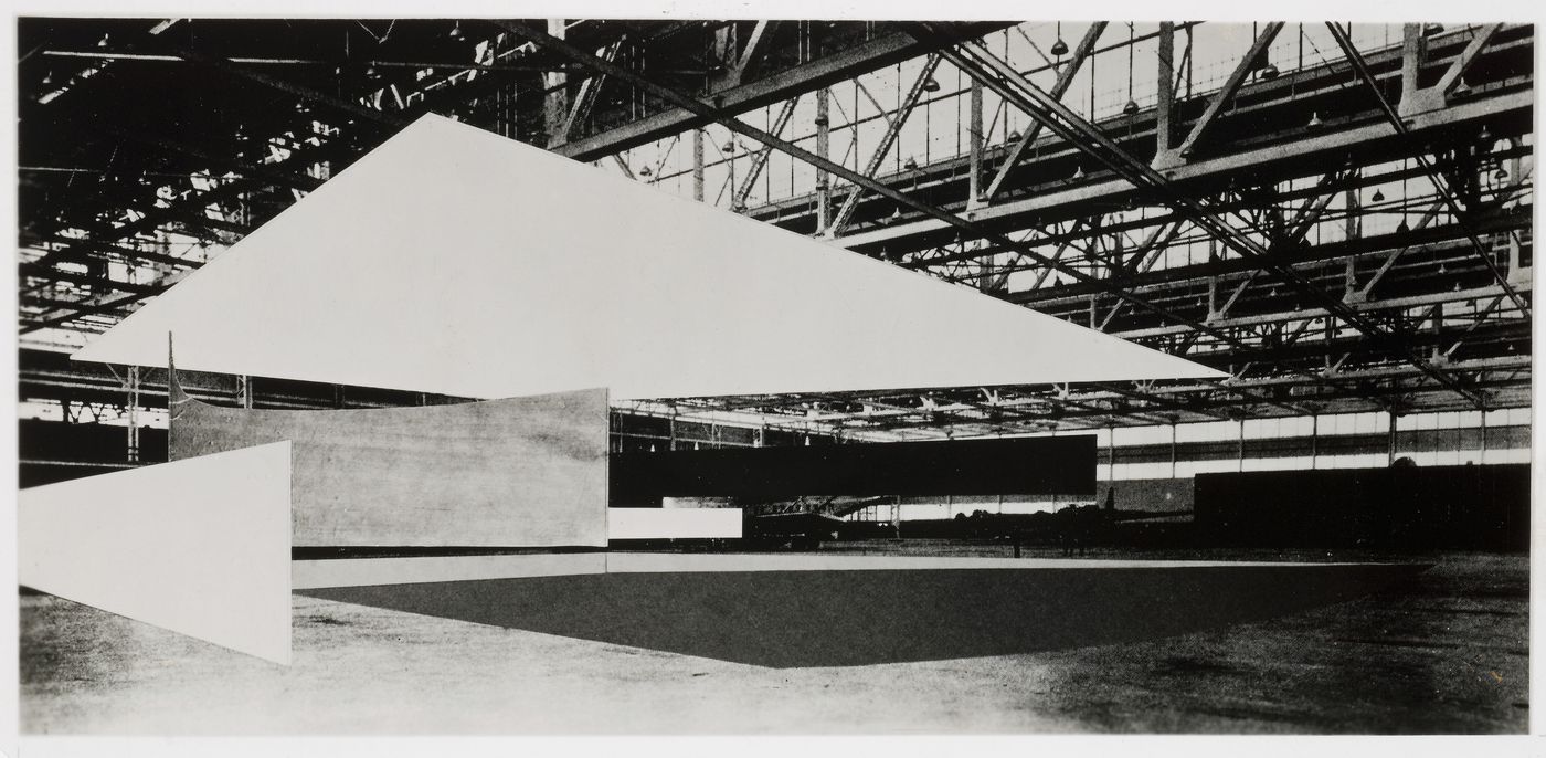 Photograph of a collage for a Concert Hall composed of paper cutouts representing acoustical screens over a photograph of Albert Kahn's 1937 Assembly Building for the Glenn L. Martin Company aircraft plant, Middle River, Maryland