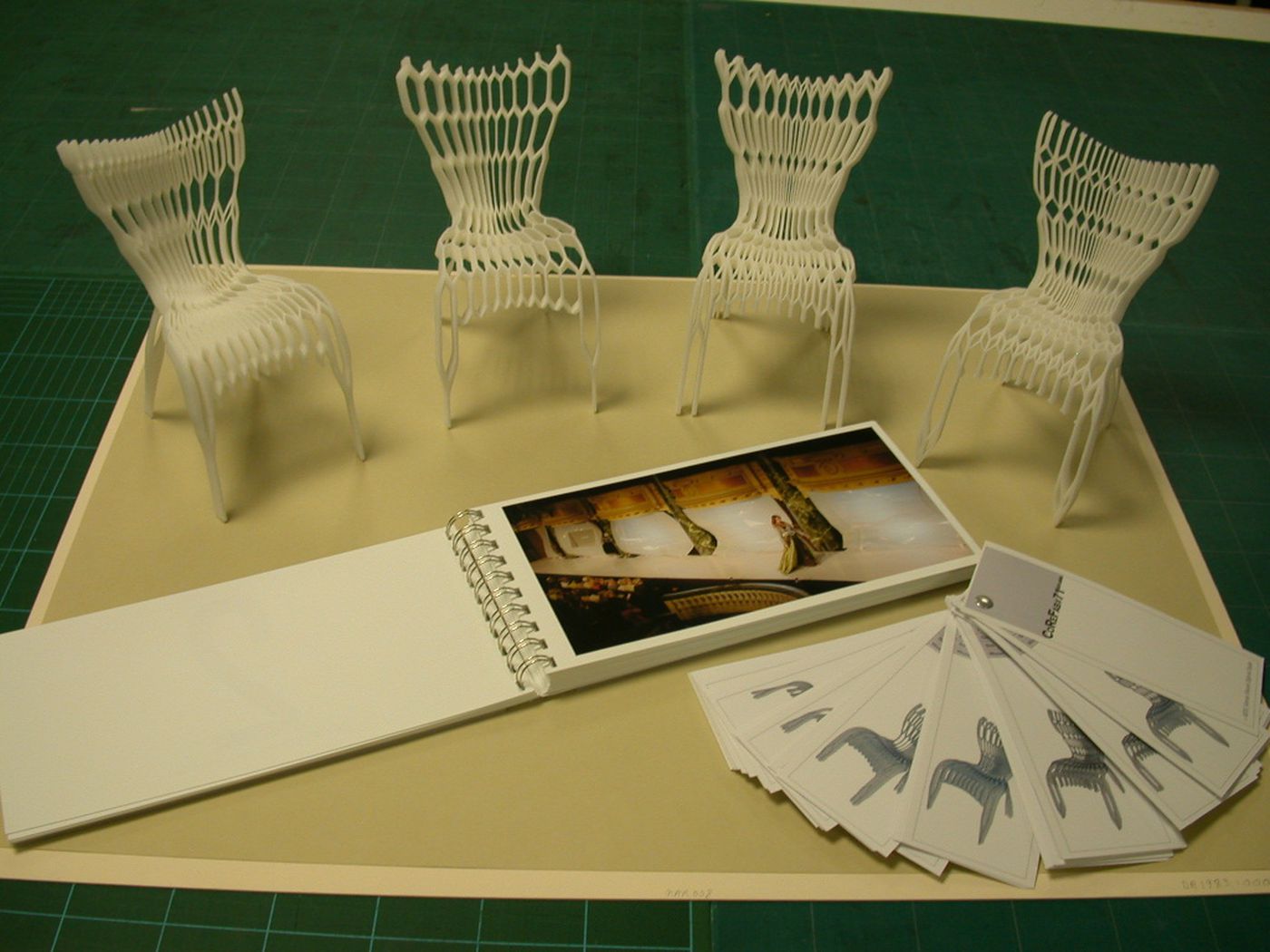 Models of four variations of the CoReFab #71 chair by Ammar Eloueini and François Brument, with cards showing variations of the chair, and agency prospectus
