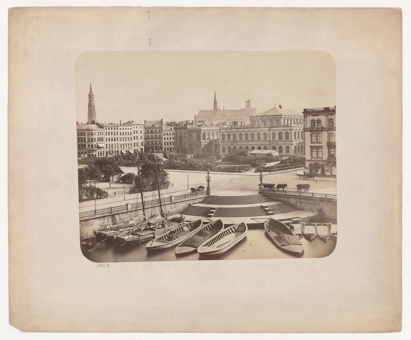 Boats, barges and stairway to plaza with construction of Hamburg Cathedral in background, Germany