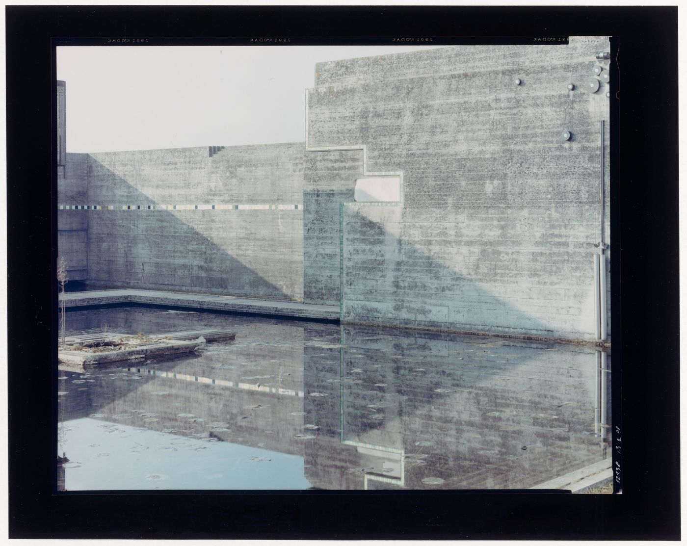 View of the pool, perimeter wall and propylaeum, Cimitero Brion, San Vito d'Altivole, near Asolo, Italy