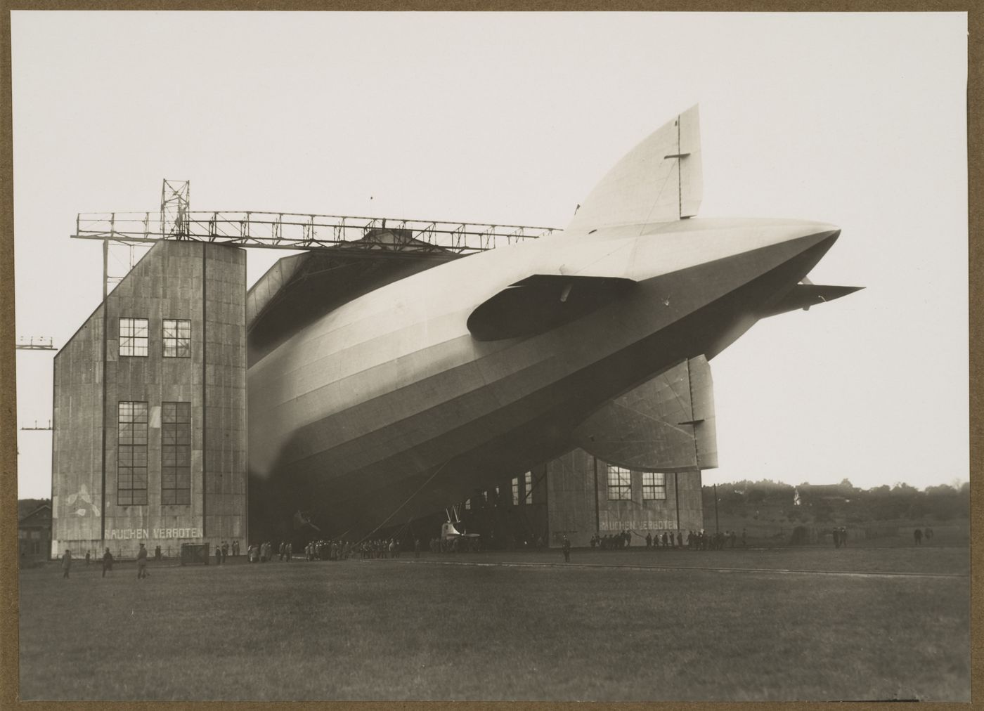 View of the tail end of zeppelin LZ 126 leaving the hangar