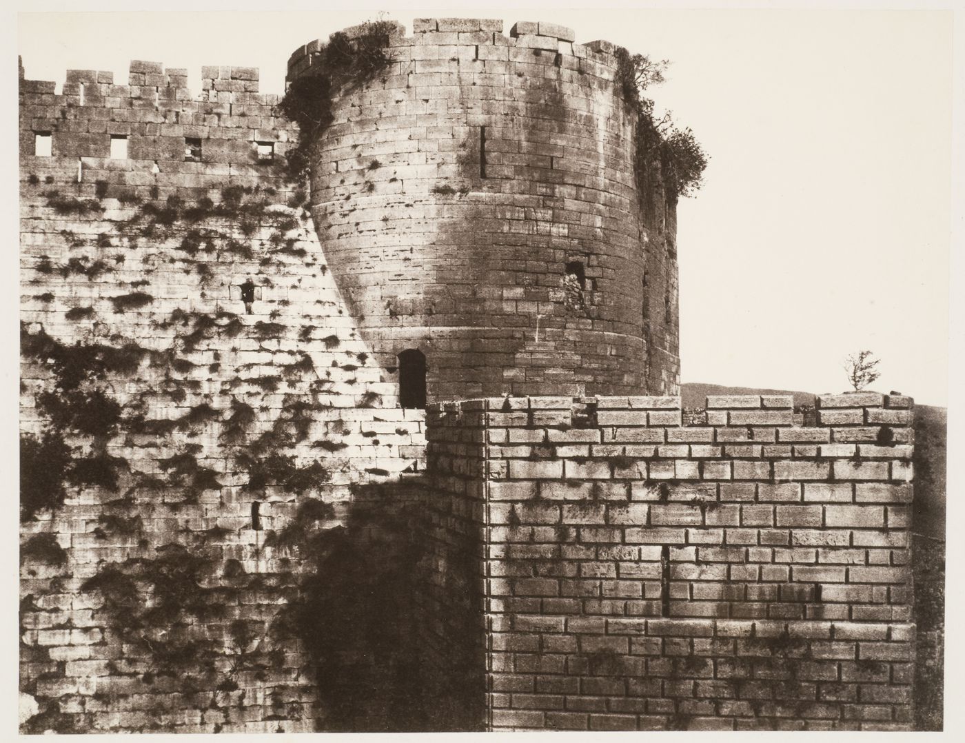View of the exterior walls of the second enclosure of the Krak of the Knights Castle from the south, Ottoman Empire (now in Syria)
