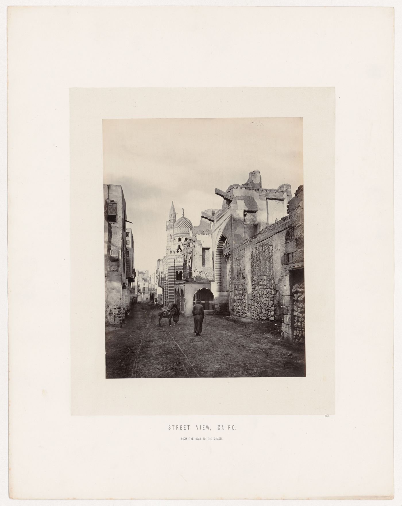 View along the Darb al-Ahmar looking north, showing the Madrasah and Tomb of Amir Aytmish al-Baghasi, Cairo, Egypt