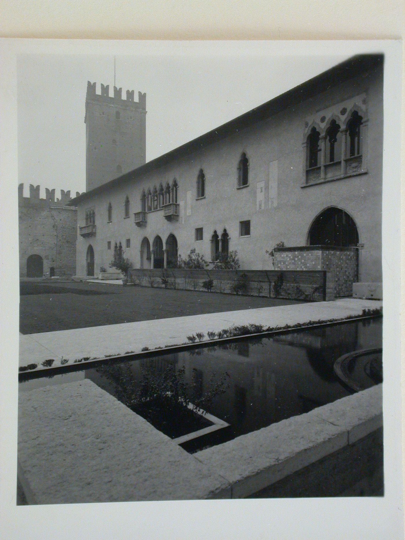 View of the courtyard showing a pool and the Torre del Mastio, Museo di Castelvecchio, Verona, Italy