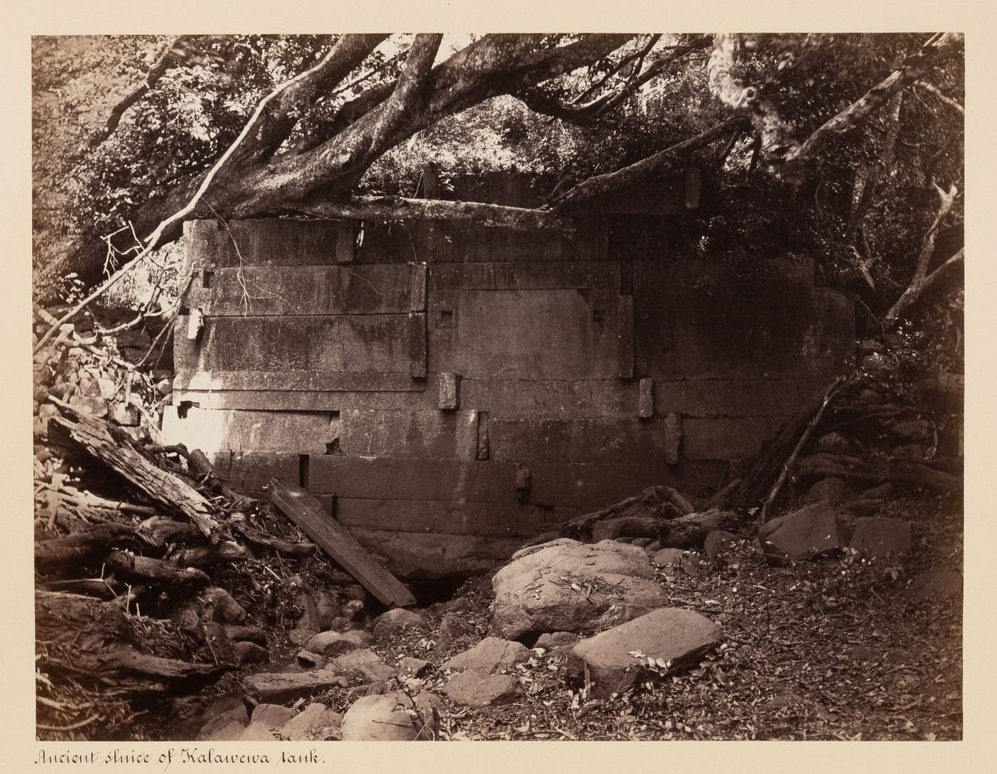 View of a sluice, Kalawewa water tank, Kalawewa, Ceylon (now Sri Lanka)