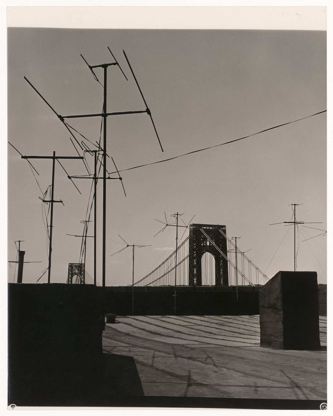 Antennas on roof with George Washington Bridge, New York City, New York