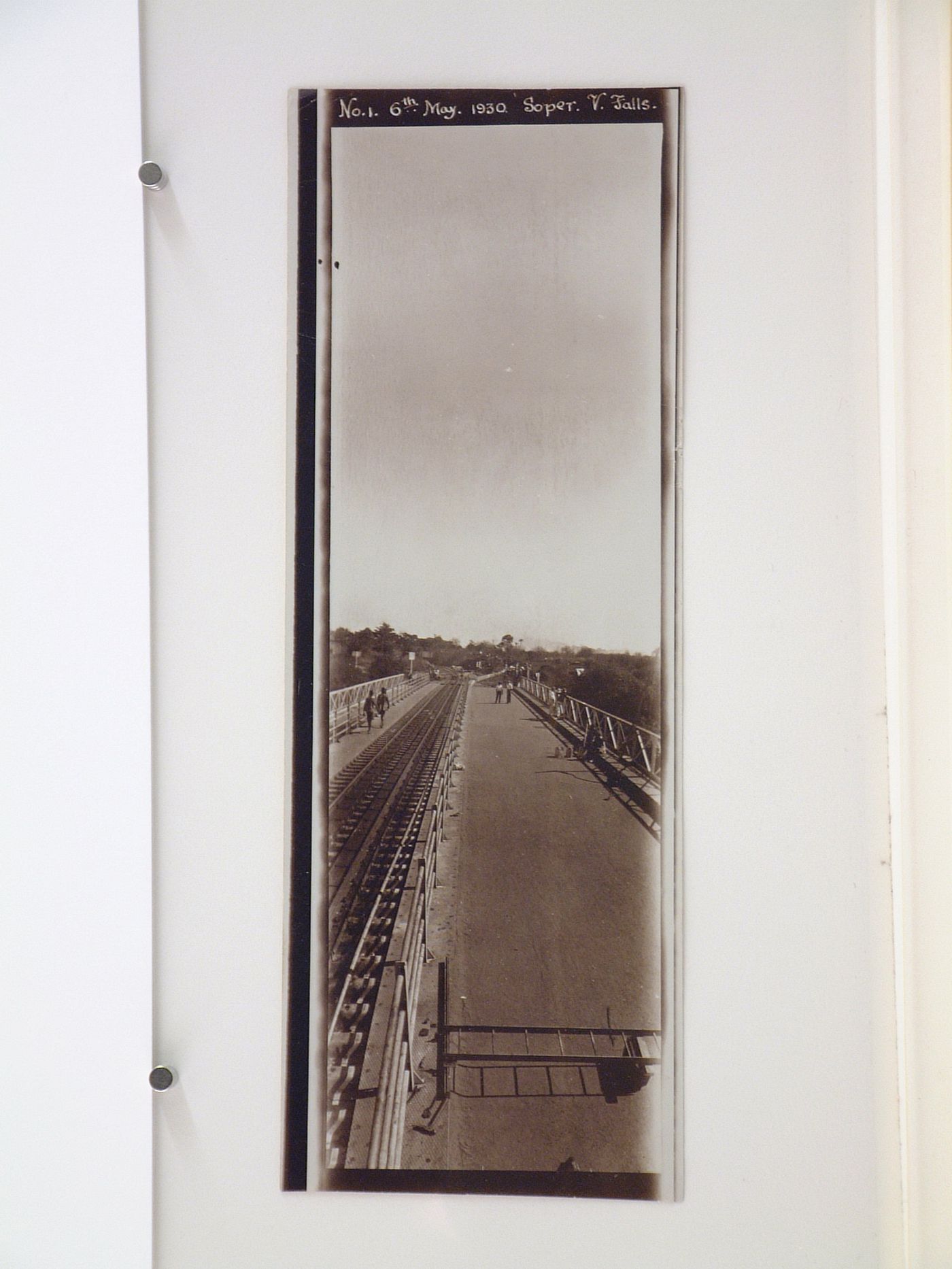 Vertical panoramic view of railway, road and footpath on Victoria Falls Bridge, Zambezi River, crossing the border between Victoria Falls, Zimbabwe and Livingstone, Zambia