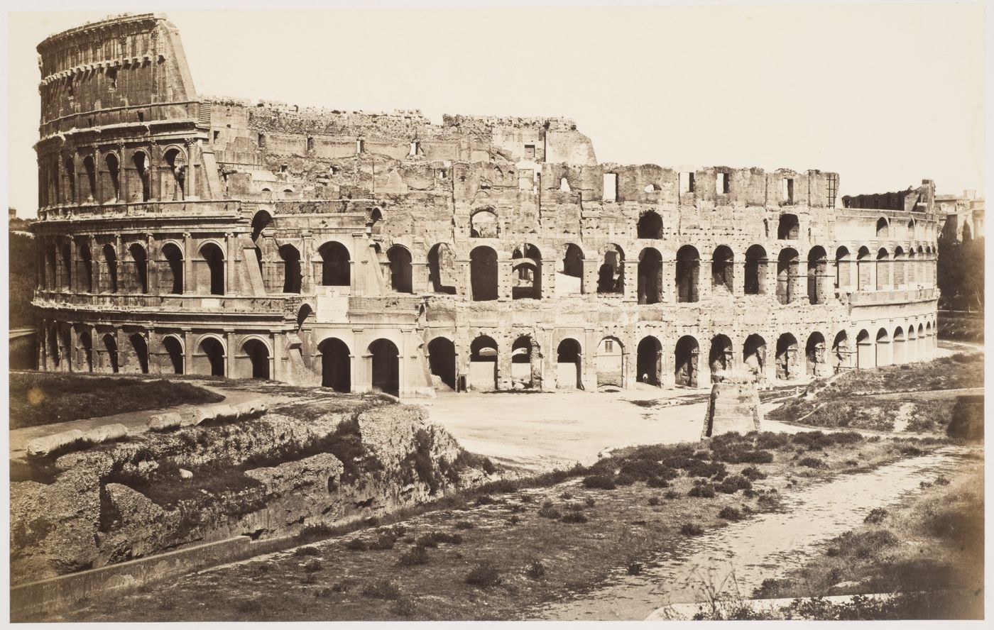 View of the Colosseum and the Meta Sudans, via Sacra, Rome, Italy