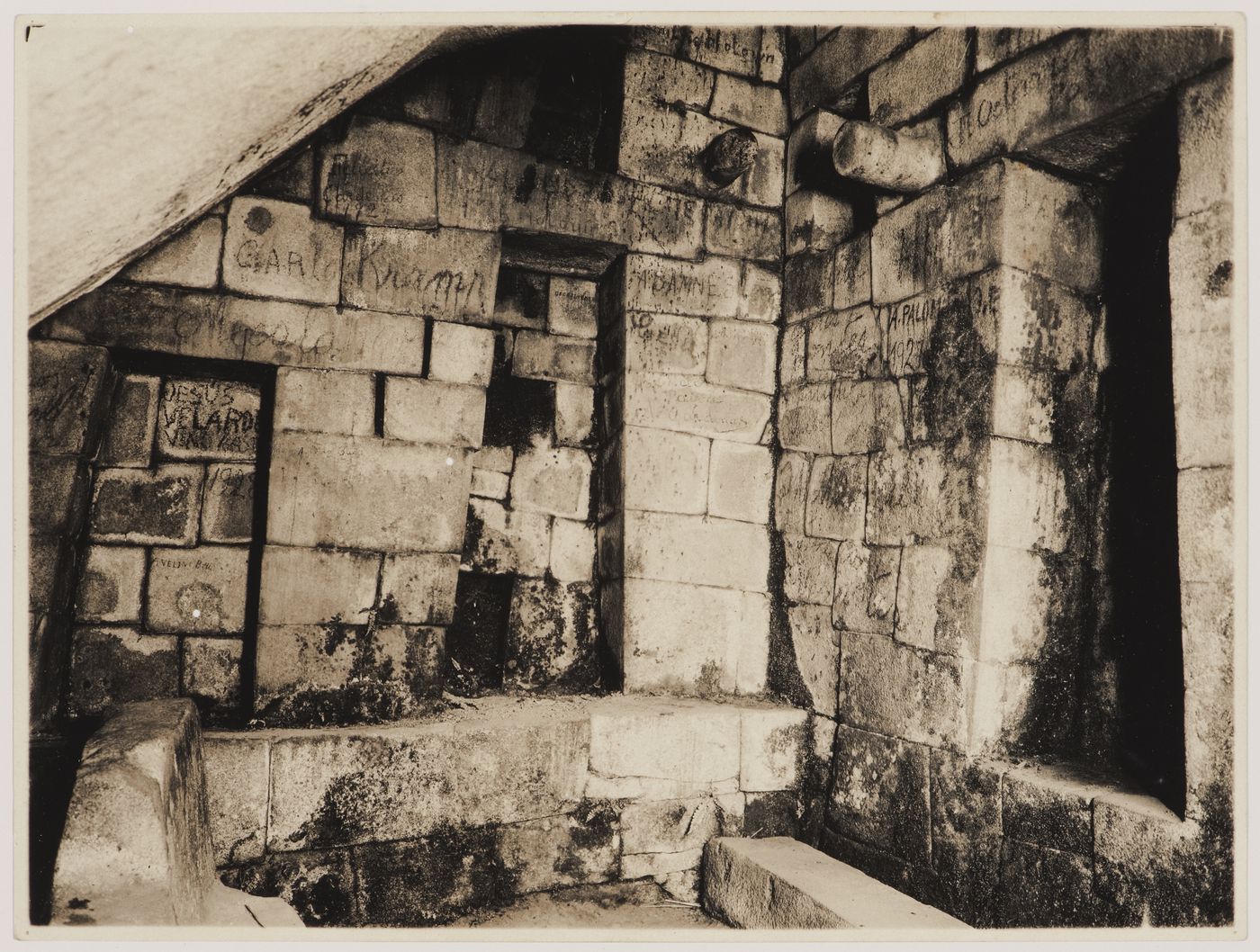 Interior view of the Royal Mausoleum showing trapezoidal niches below the Torreón, Machu Picchu, Peru