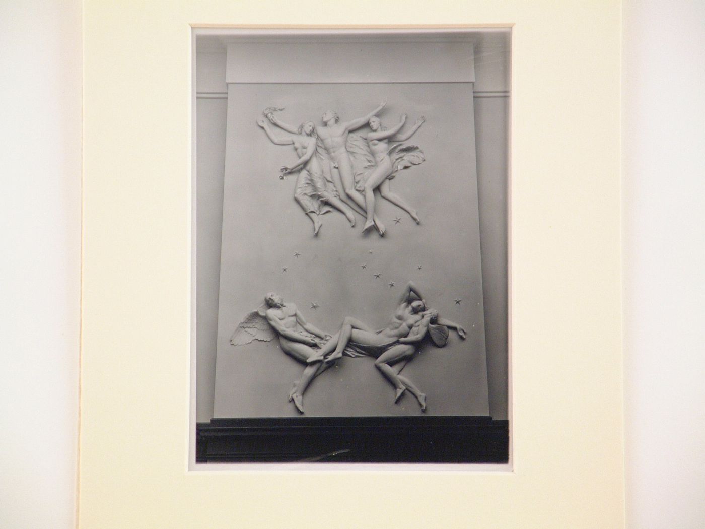 Detail of relief sculpture depicting winged, and other flying nude figures, Munich, Germany