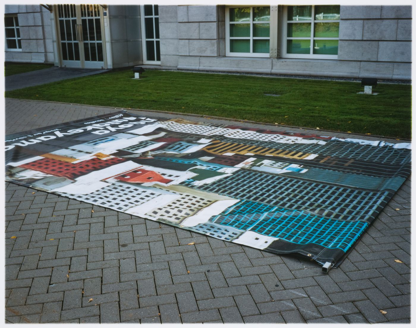 View of  "Naoya Hatakeyama: Scales" exhibition banner prior to its installation on the main façade of the Canadian Centre for Architecture, Montréal