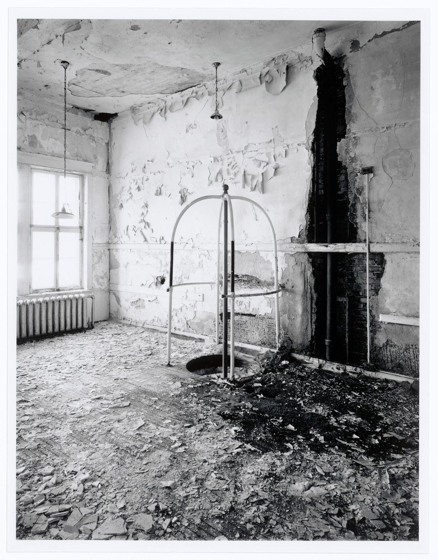 Interior view of the top of the sliding pole on the third floor of Fire Station no. 21, 1200 Mill Street, Montréal, Québec